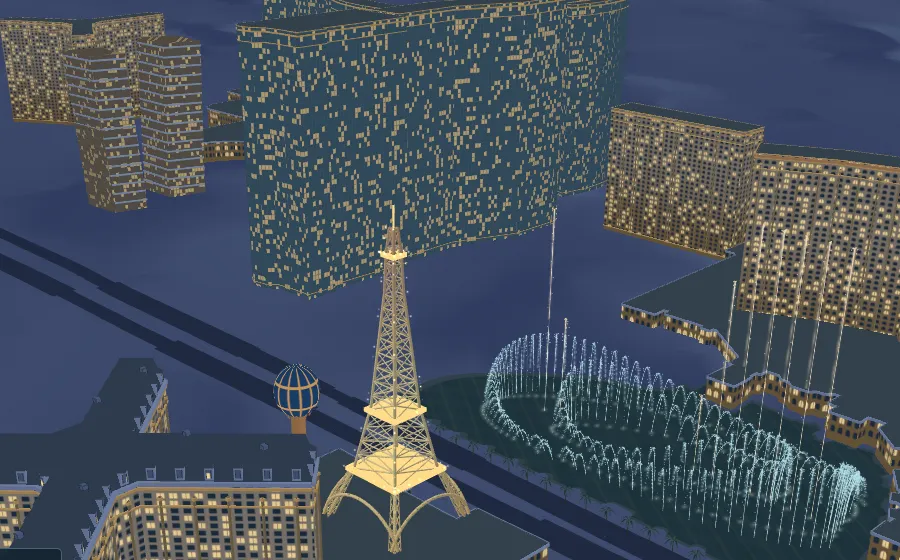 The same view at night, windows and the tower lit.